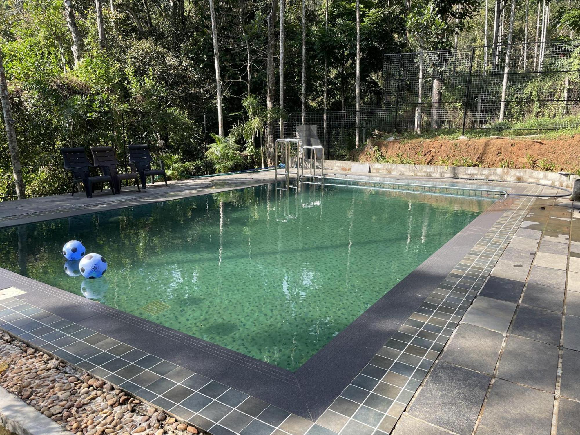 Wetlands Wayanad Pool Resort With Natural Waterfalls Padinjarathara Exterior photo